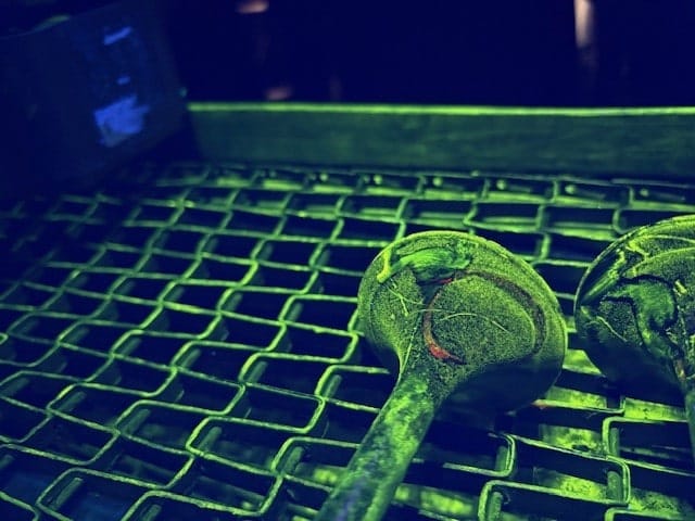 A green grid displayed prominently, emphasizing its bright hue and ergonomic features.