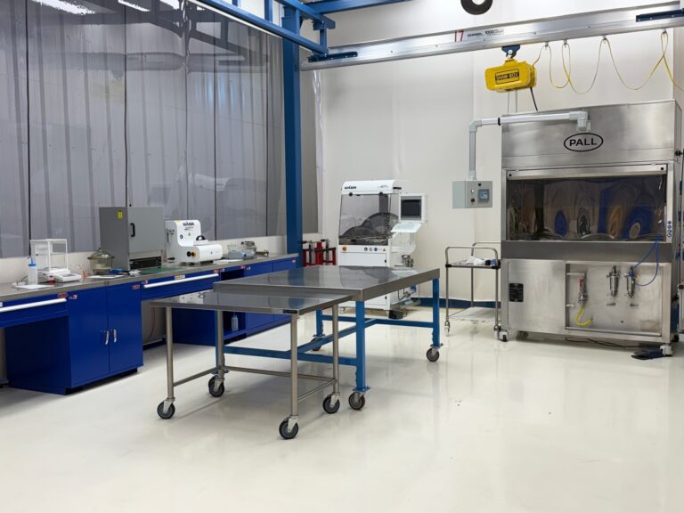 Technical cleanliness testing laboratory clean room at Industrial Inspection Company in Monroe, Michigan, with PALL and Gläser extraction cabinets, drying oven, analytical balance and an overhead bridge crane